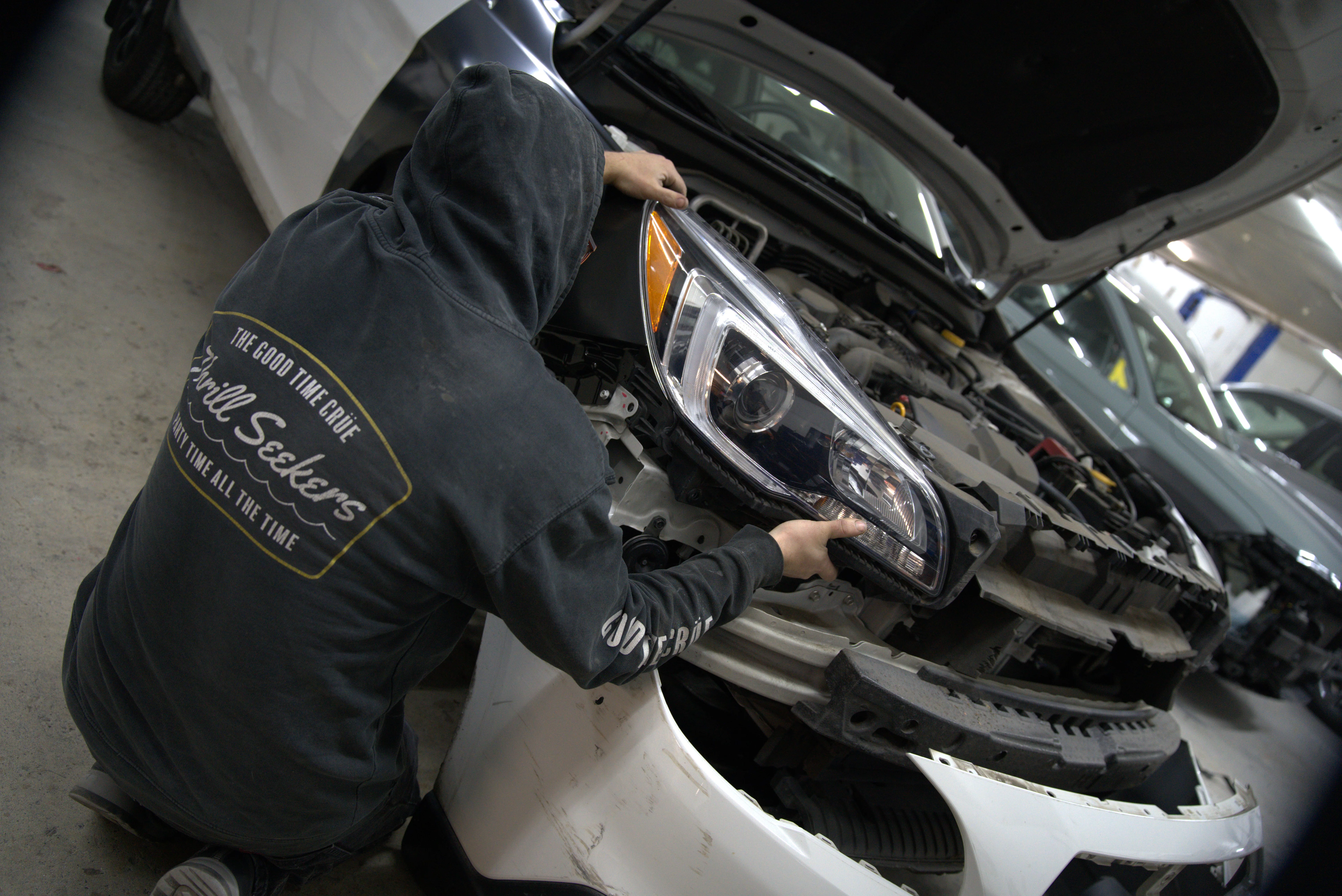 Hail damage repair Vancouver WA - Five Star Auto Body technician working on vehicle