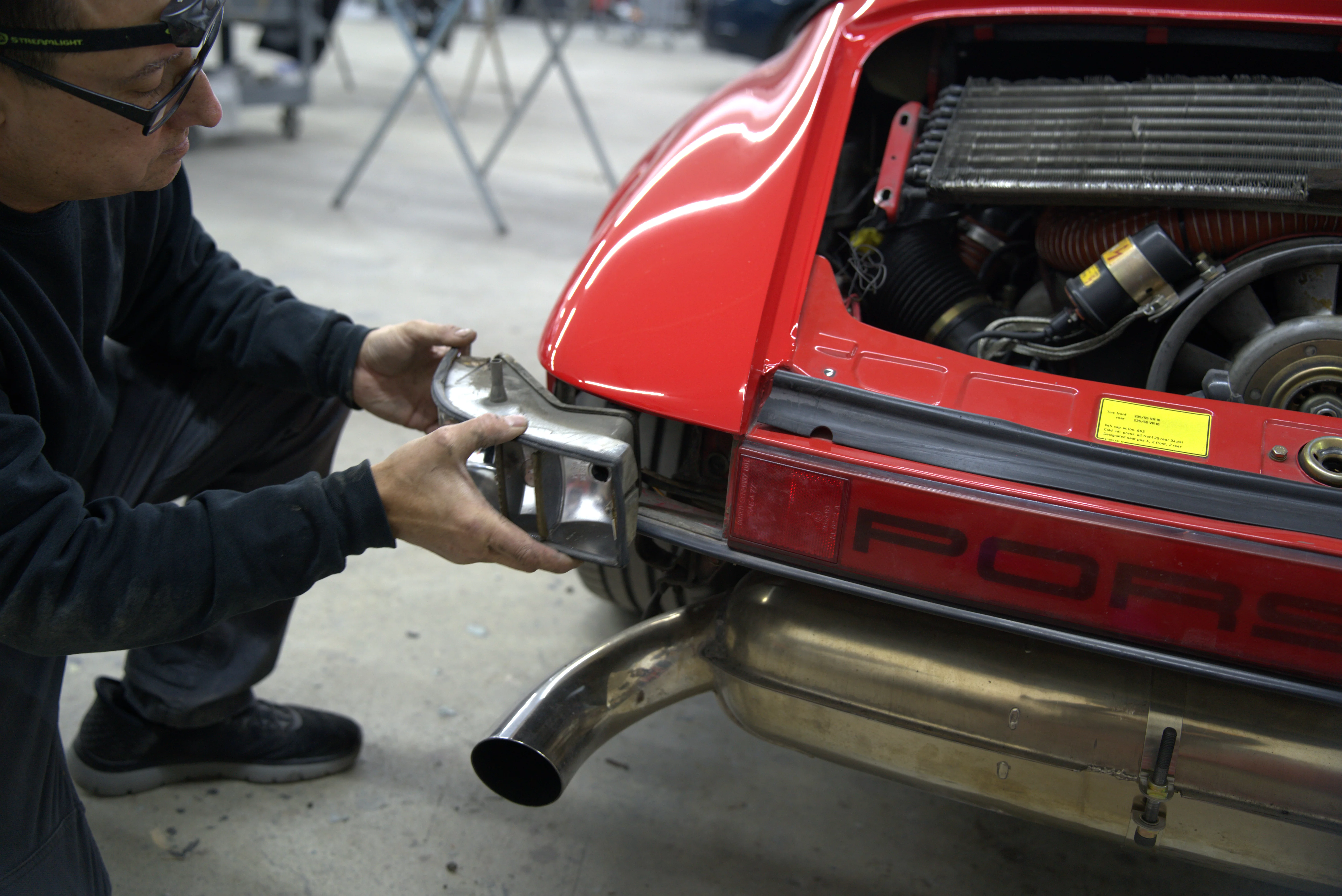 Professional dent repair technician working at Five Star Auto Body Longview WA