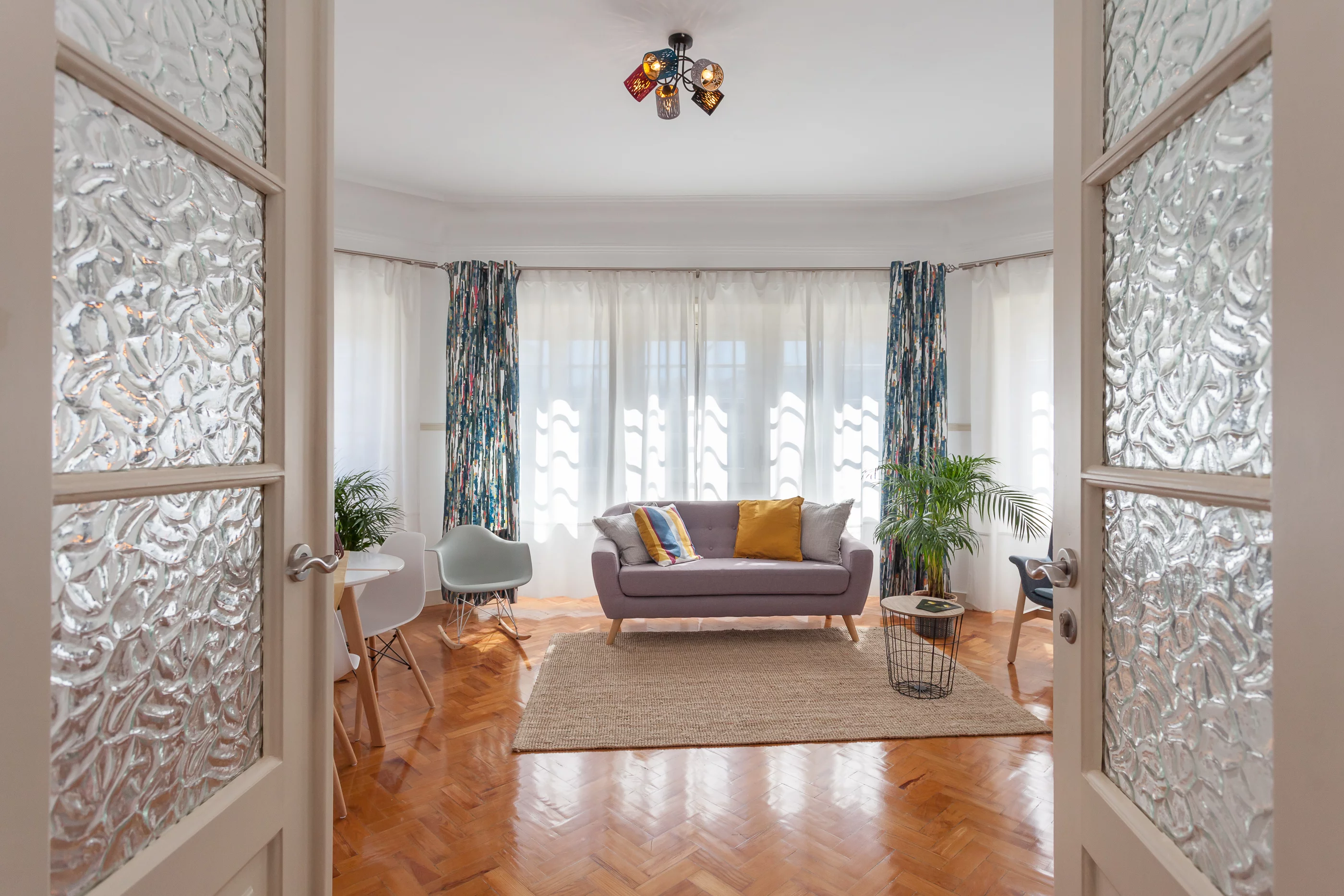 entrance to a relaxing living room with plenty of sunlight