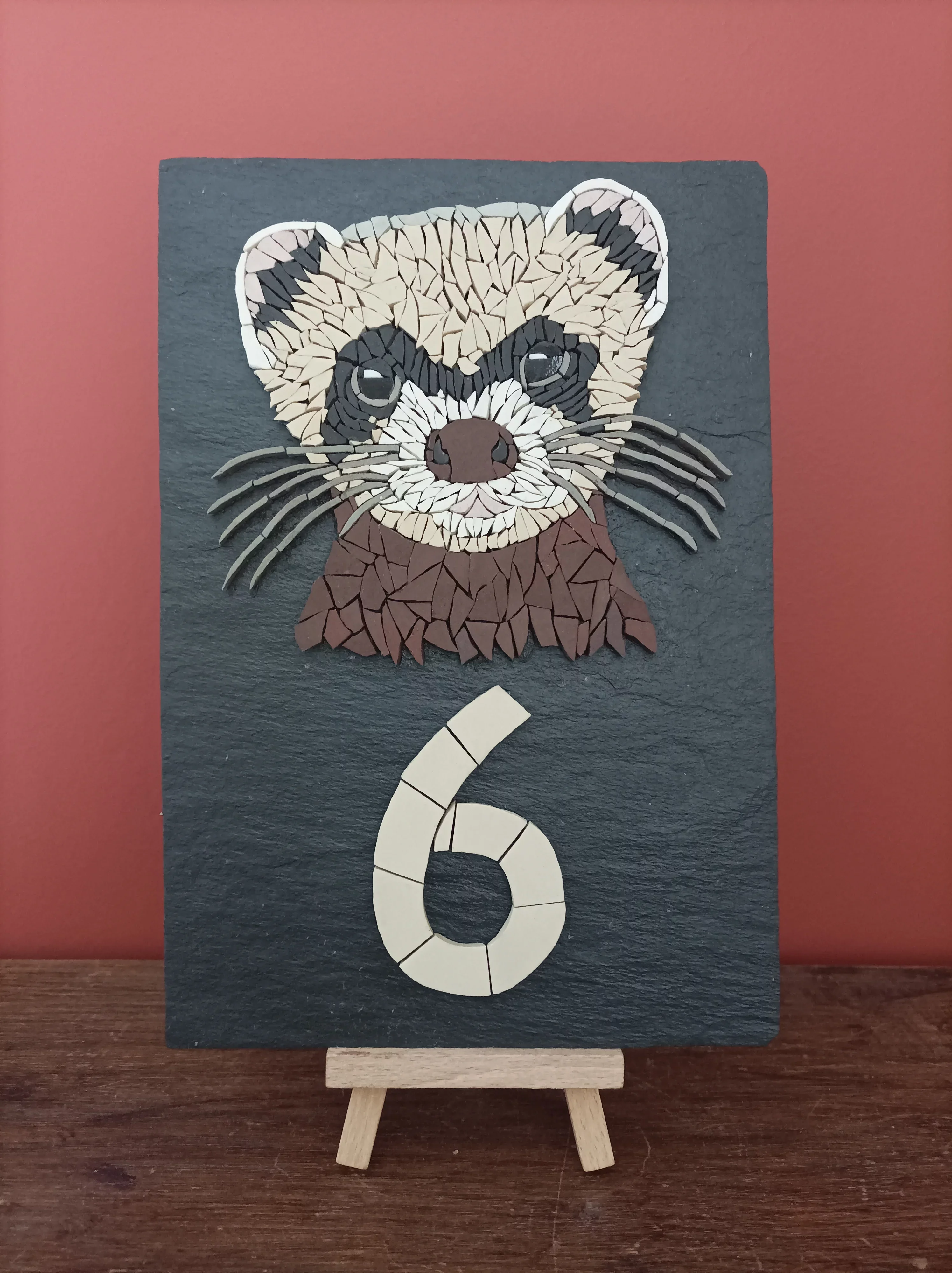 Mosaïque d'un furet pour un numéro de porte