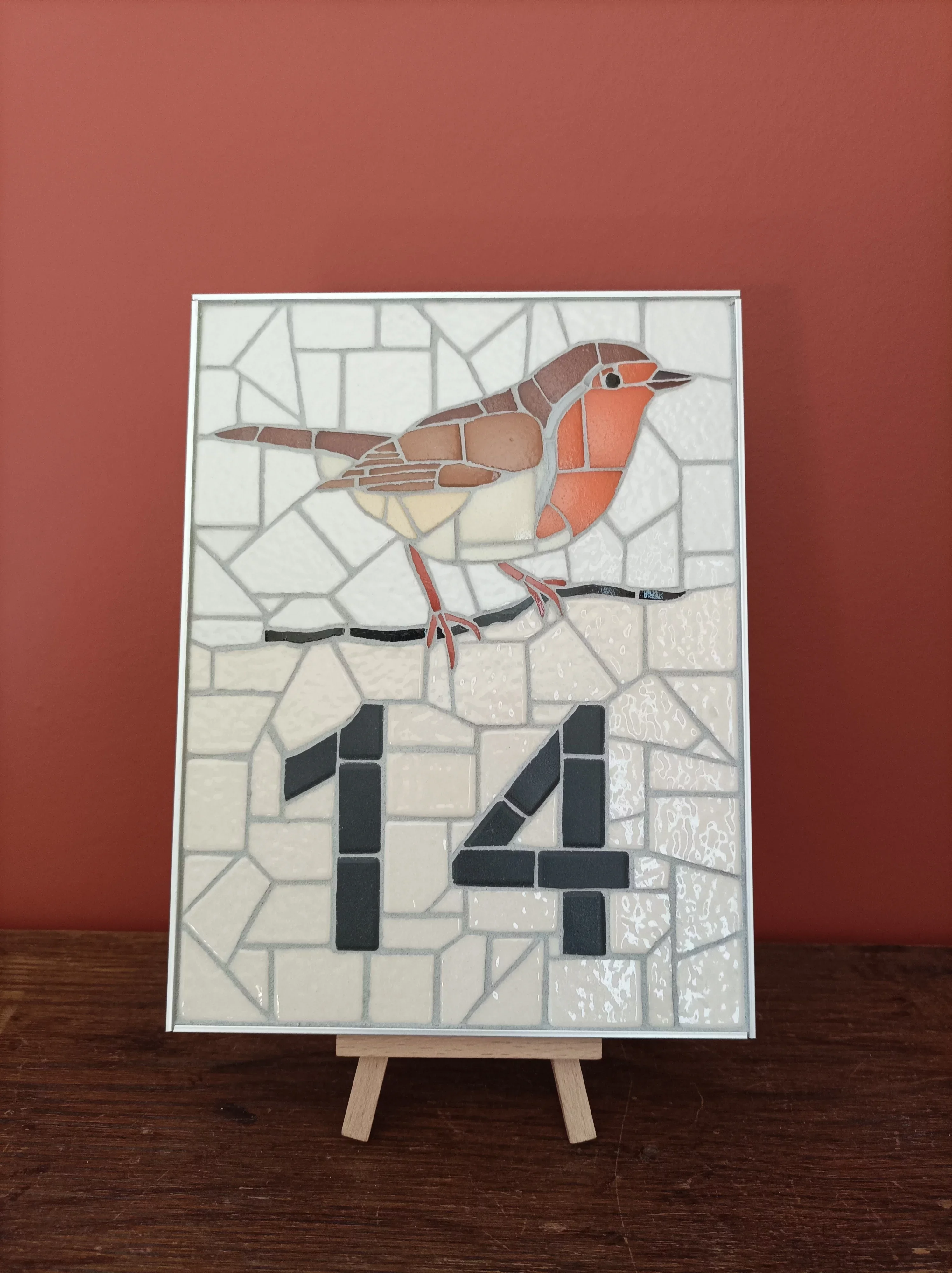 Mosaïque d'un rouge gorge pour un numéro de porte