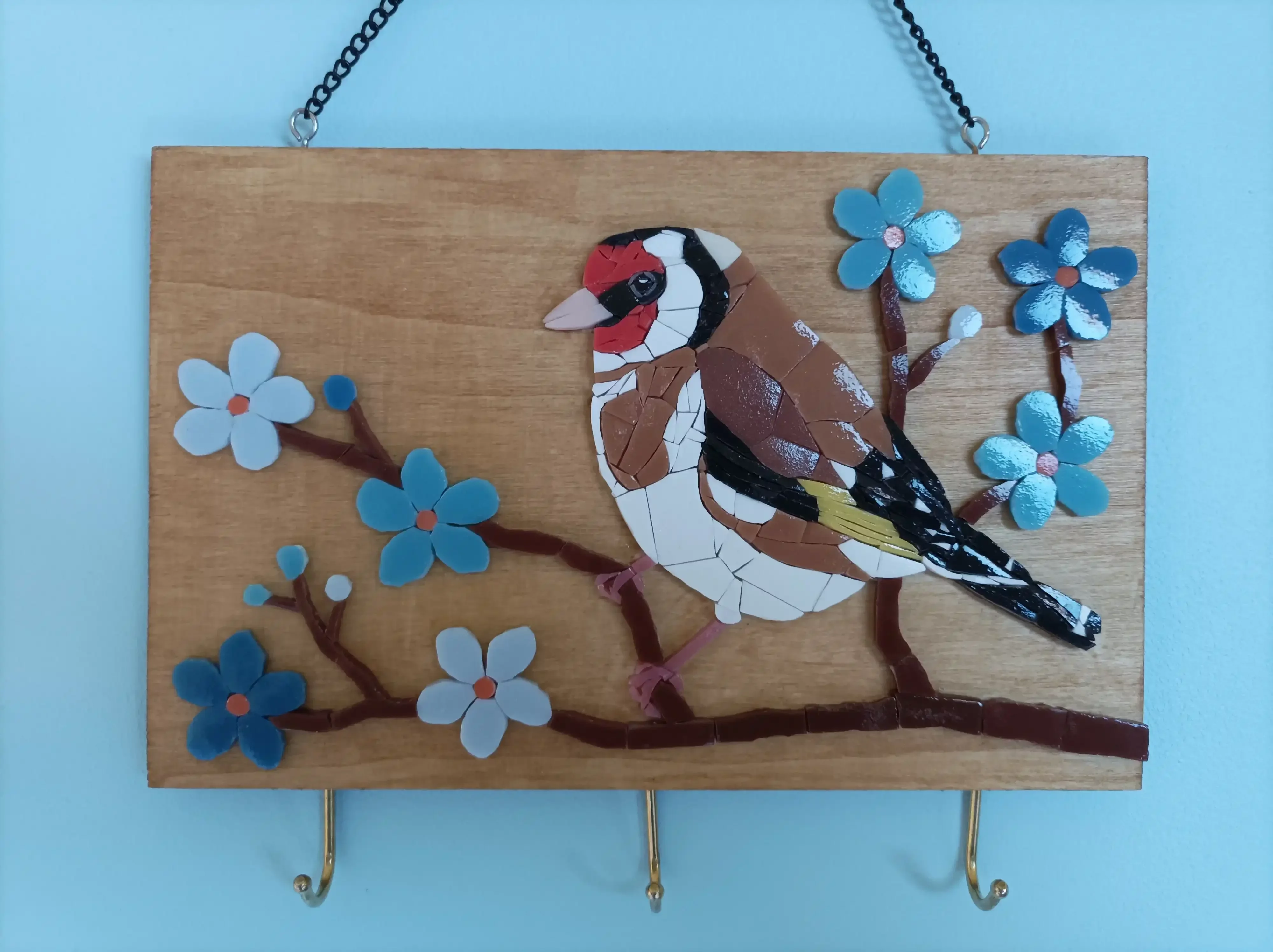 Mosaïque d'un chardonneret élégant pour un magnet