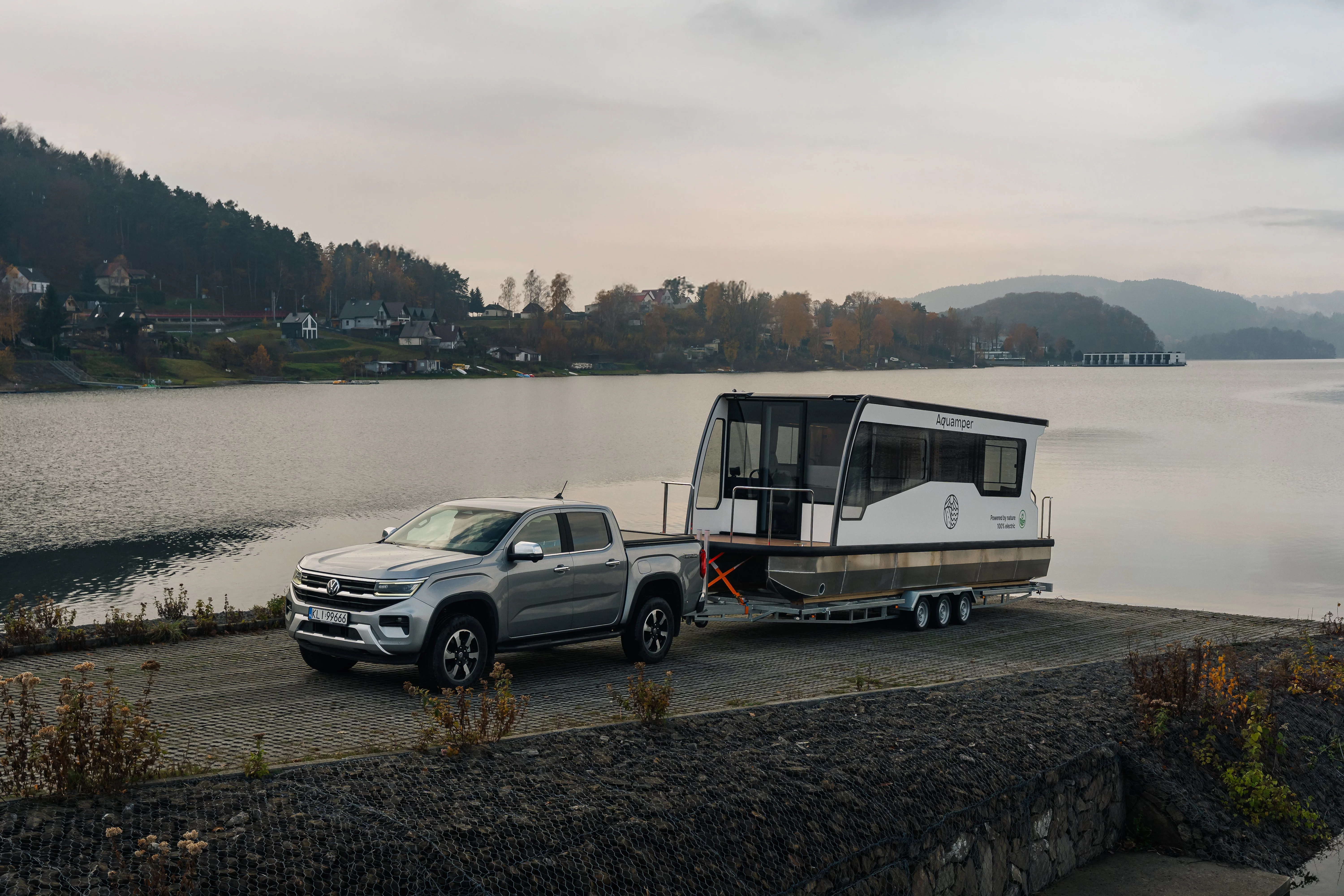 brown and black boat on body of water during daytime