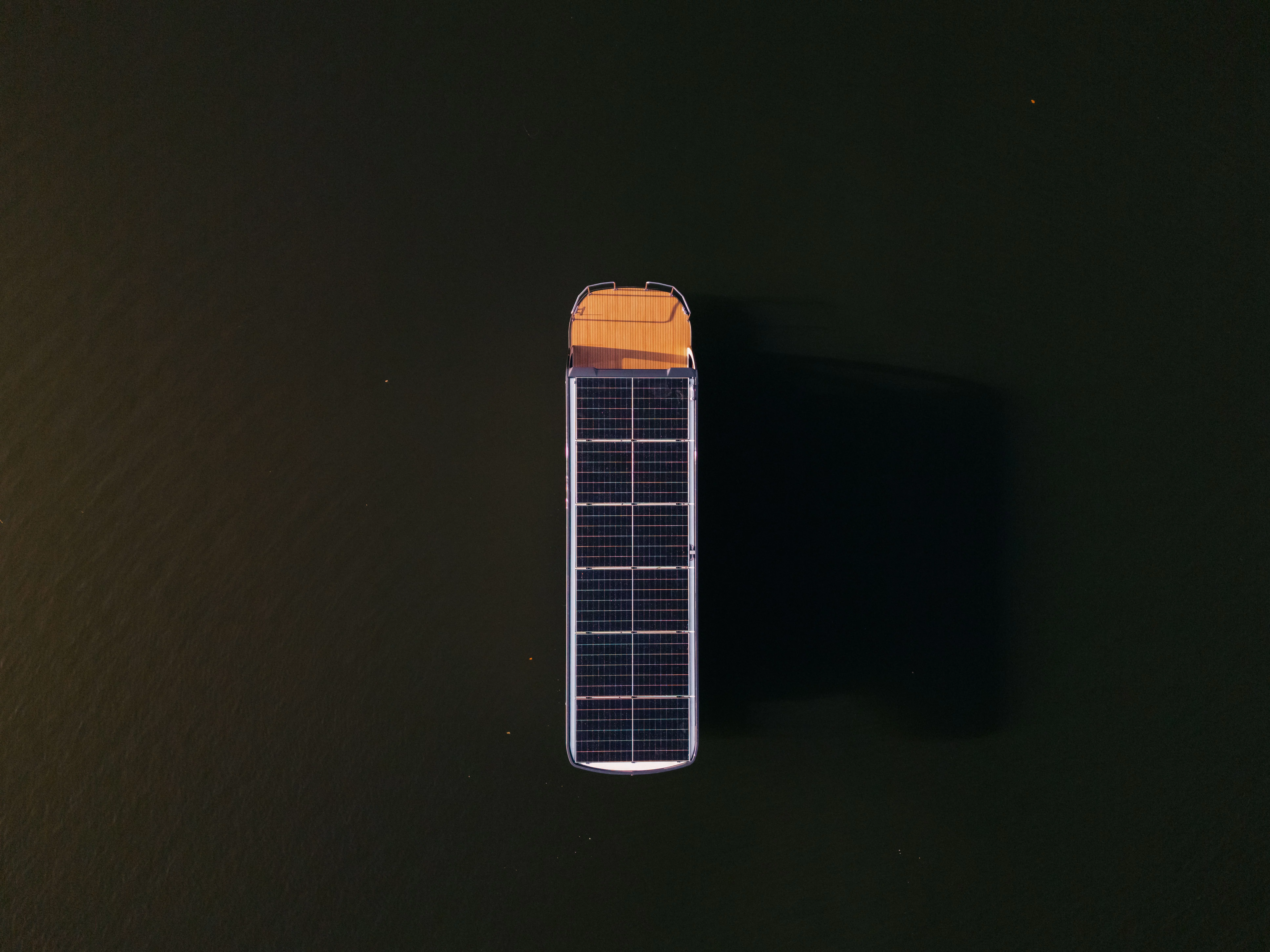 white and brown boat