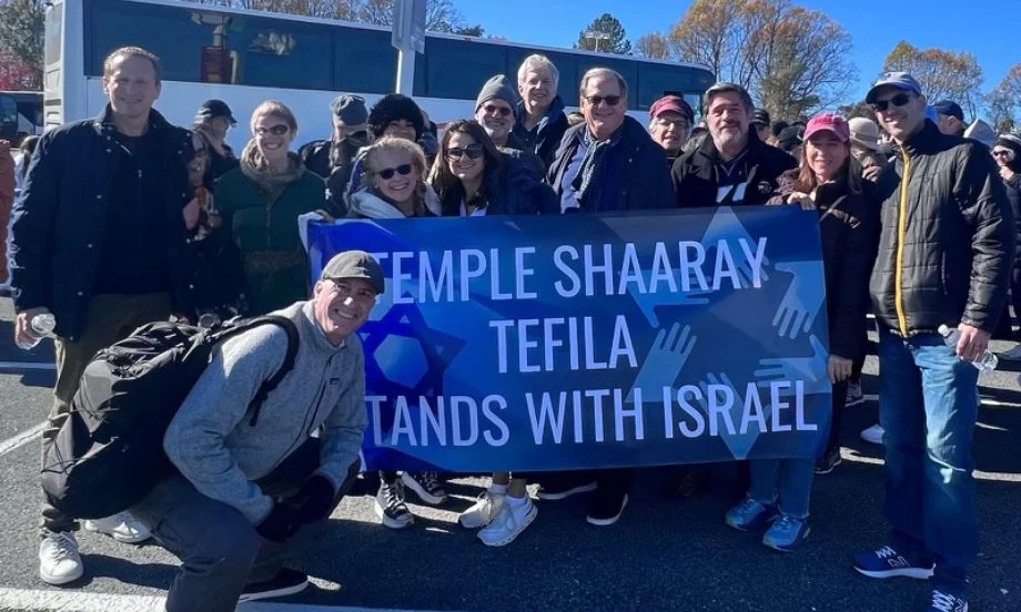 people holding signs for climate change march