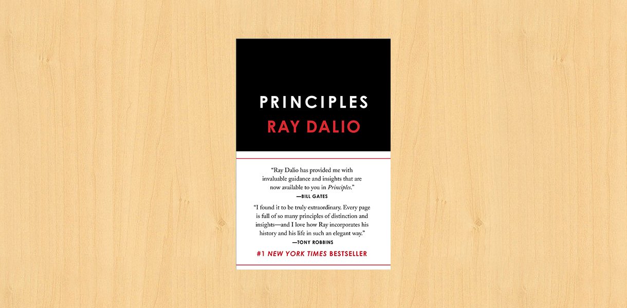 Principles book cover placed on the desk.