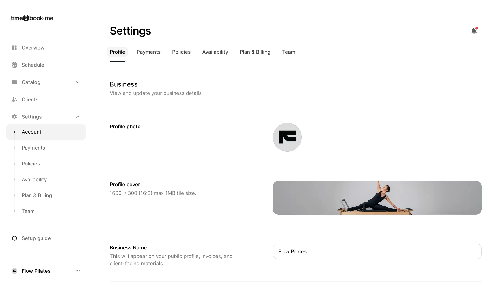 Settings view for updating business profile details in Time2book, showing profile photo, cover image, business name, phone, description, custom URL, and country.